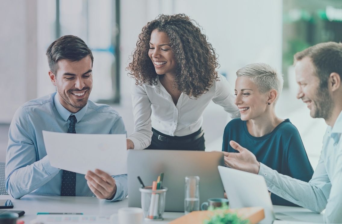 Healthcare team discussing nursing recruitment strategies to hire and retain skilled nurses.